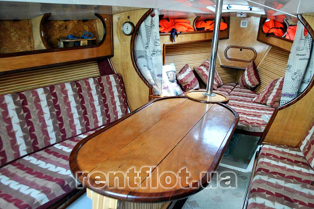 Enlarge photo of the table in the saloon of sailing yacht delta Table in the saloon of sailing yacht Delta