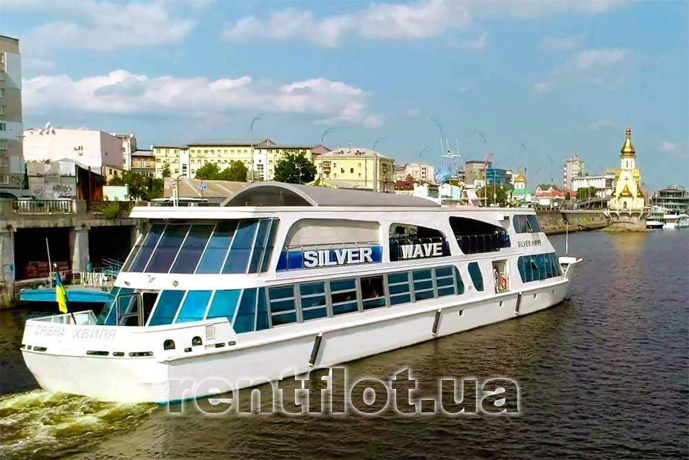 Збільшити фото теплохода Срібна Хвиля на тлі міста Теплохід Срібна Хвиля на тлі міста