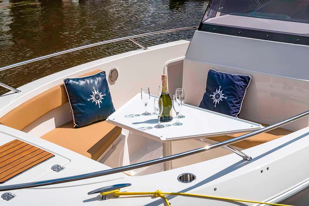 Enlarge photo of the buffet table on the bow cockpit of the motor boat Atlantic-750 Buffet on the bow cockpit of the motor boat Atlantic-750