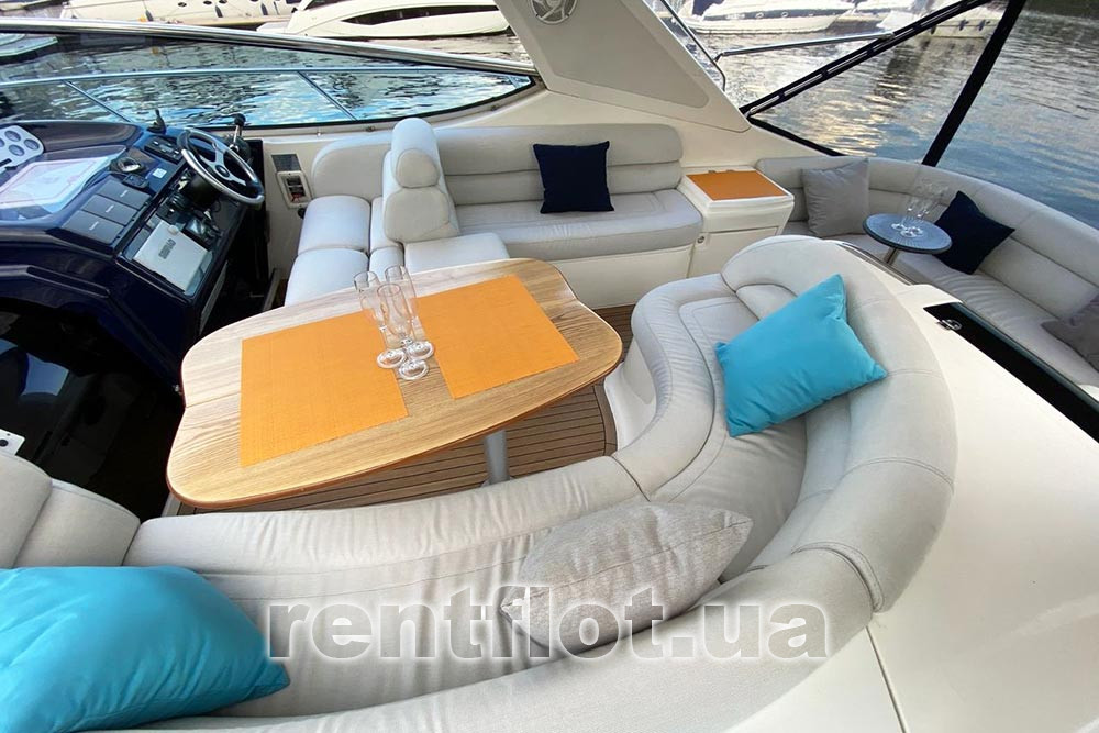 Enlarge photo of the table in the cockpit of motor yacht Amore Cockpit table of motor yacht Amore