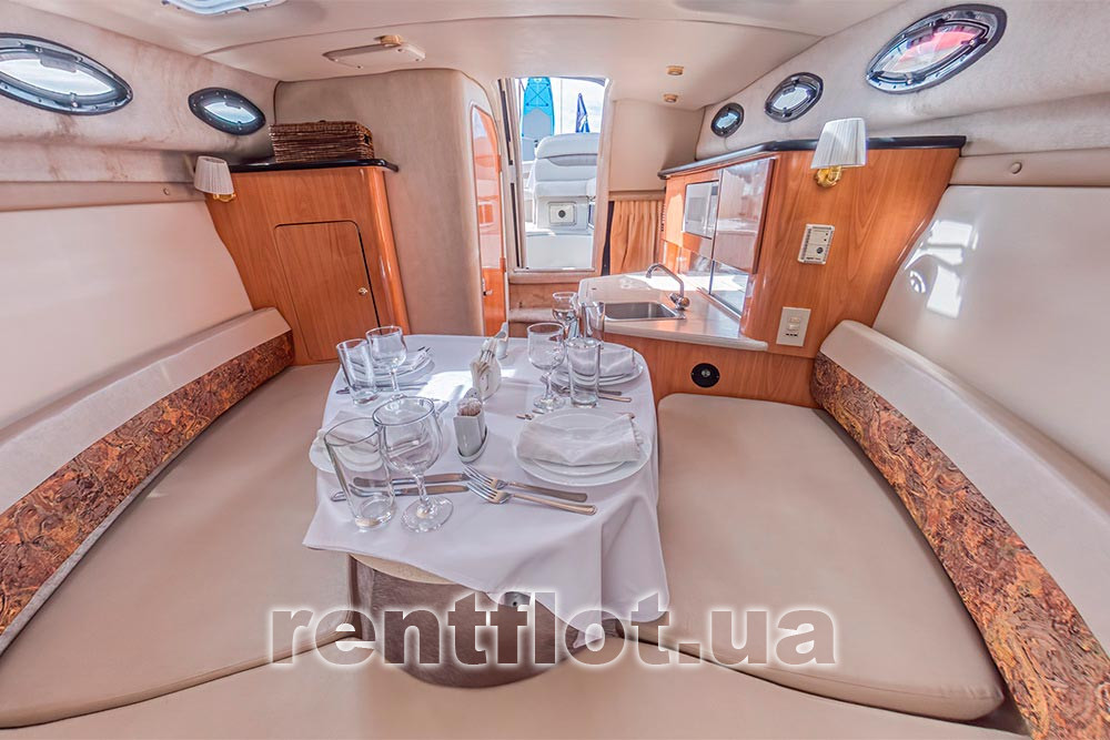 Enlarge photo of the banquet in the saloon of the motor yacht Regal-2660 Banquet in the saloon of motor yacht Regal-2660