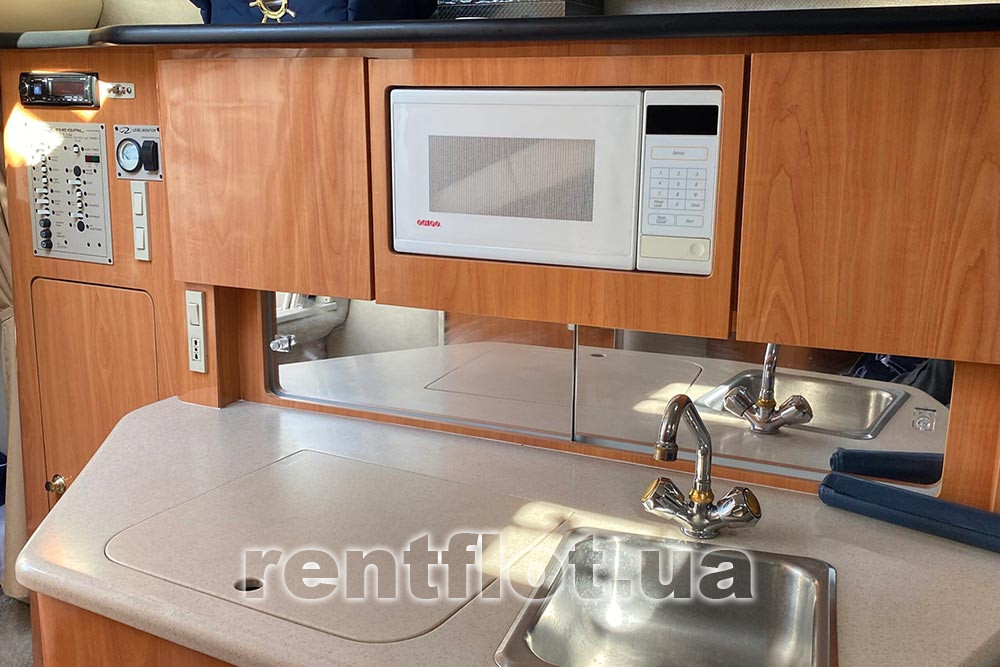 Enlarge photo of the galley in the saloon of motor yacht Regal-2660 Galley in the saloon of the motor yacht Regal-2660