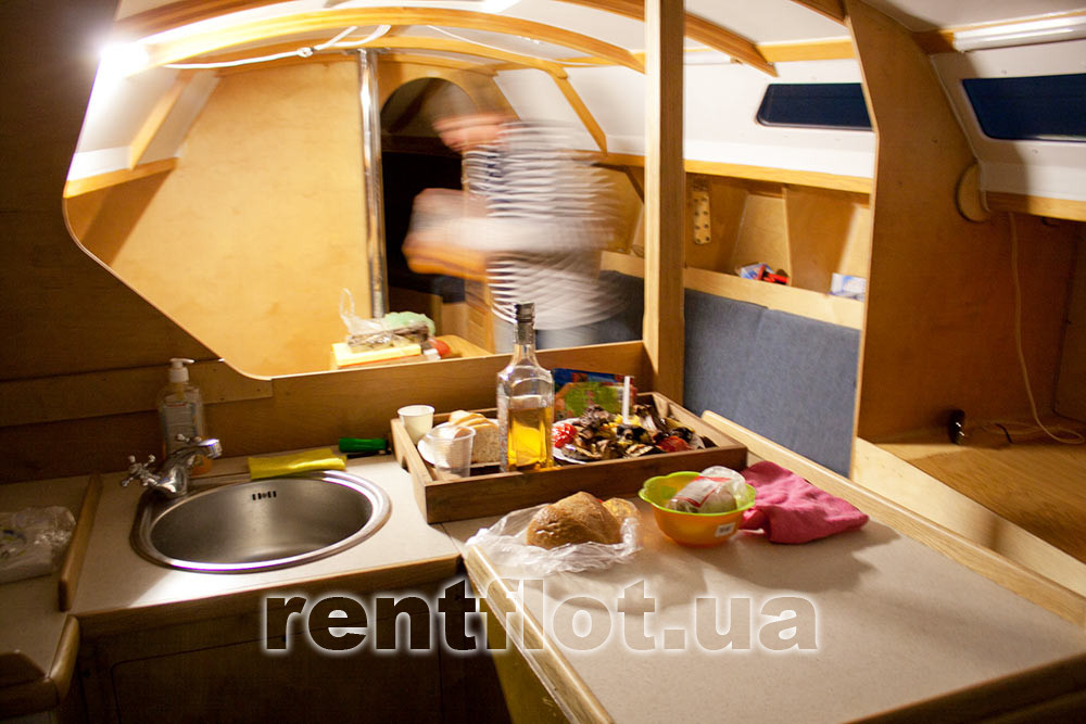 Enlarge the photo of the feast in the saloon of the sailing yacht Estra Feast in the saloon of sailing yacht Estra