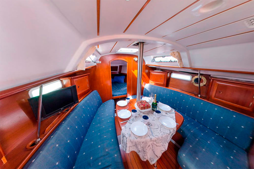 Enlarge photo of the banquet in the saloon of sailing yacht Benetu-331 Ksenia Banquet in the saloon of sailing yacht Benetu-331 Ksenia