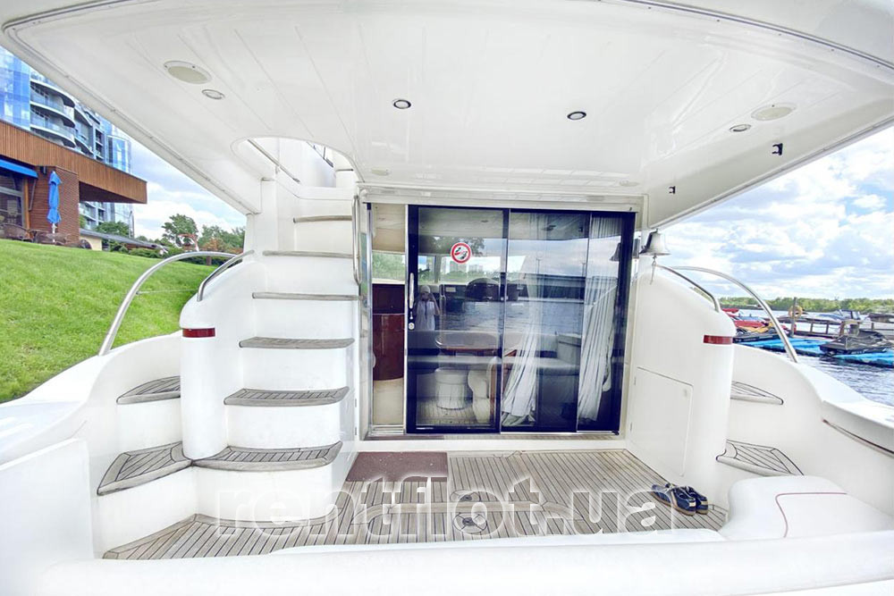 Enlarge photo of the ladder to the flybridge and the entrance to the wardroom of the motor yacht Princess-45 Ladder to the flybridge and entrance to the wardroom of motor yacht Princess-45